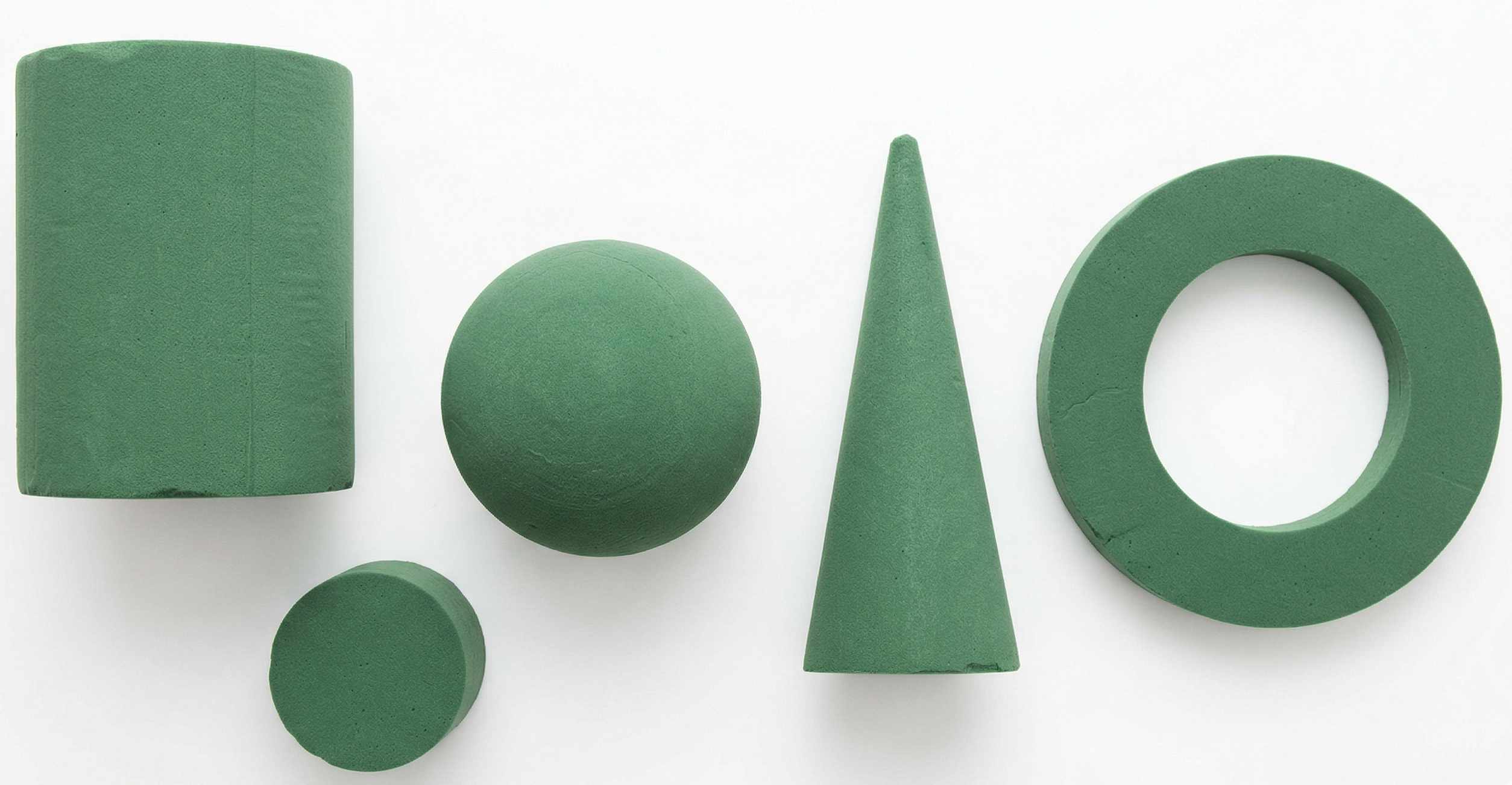 A selection of different floral foam shapes - cylinder, sphere, cone and ring A selection of different floral foam shapes - cylinder, sphere, cone and ring
