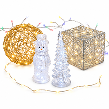 Christmas fairy lights and illuminated festive shapes on a white background
