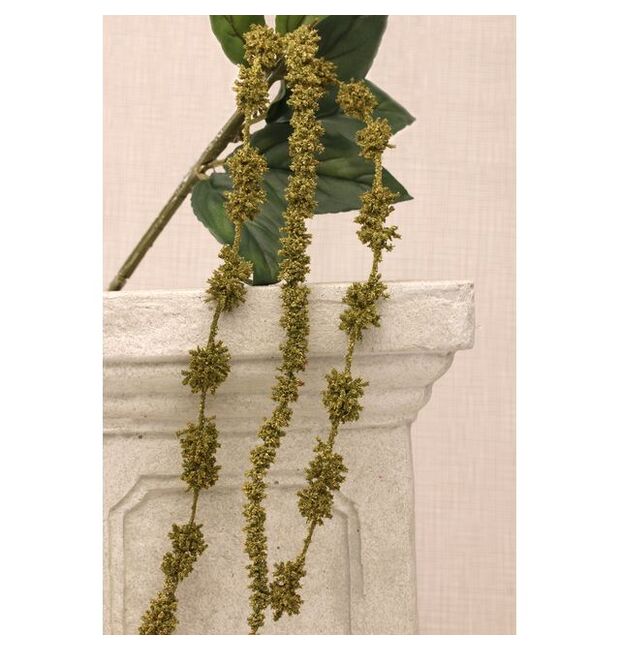 A dark green artificial Astrantia flower with a tassel.